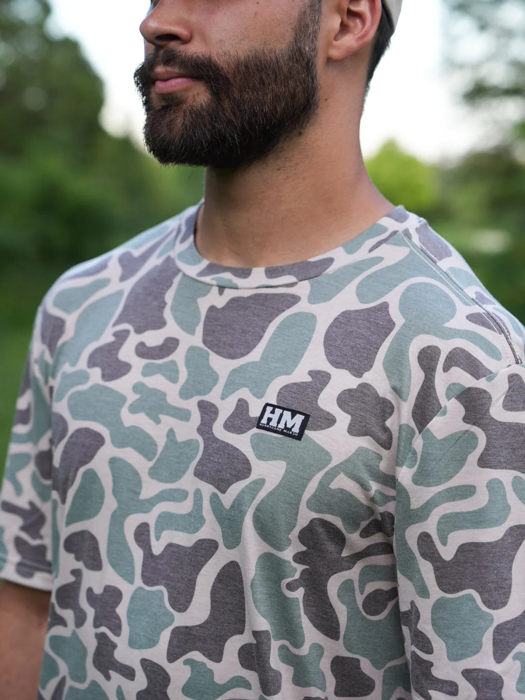 The Marsh Green Camo Migrator Performance Tee